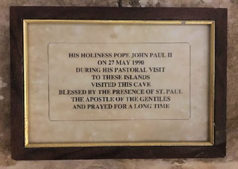 Pope St. John Paul II praying in St. Paul’s grotto.